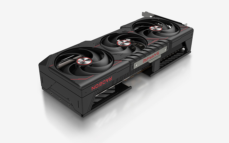 Side three-quarter angle of the SAPPHIRE PULSE Radeon RX 9070 XT 16GB GDDR6 graphics card showing the Tri-X triple-fan cooler and SAPPHIRE branding