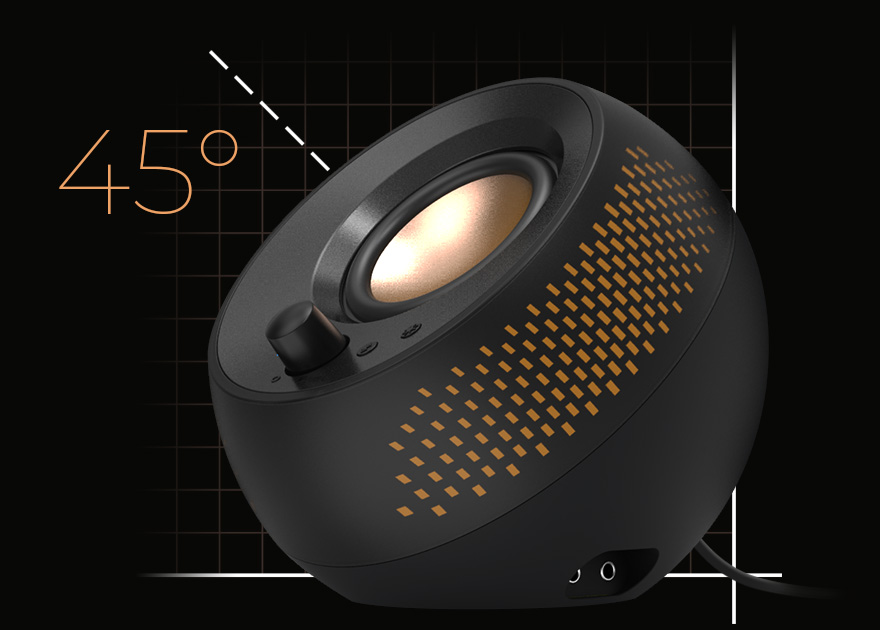 45-degree detail view of a Creative Pebble X Plus satellite speaker showing the driver, volume knob and RGB dot pattern