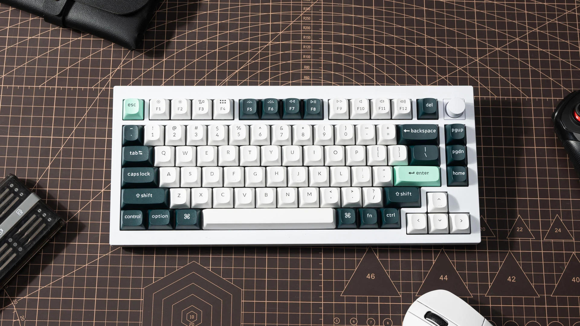 Keychron Q1 HE QMK Wireless Custom Keyboard in Shell White on a desk, top-down lifestyle shot