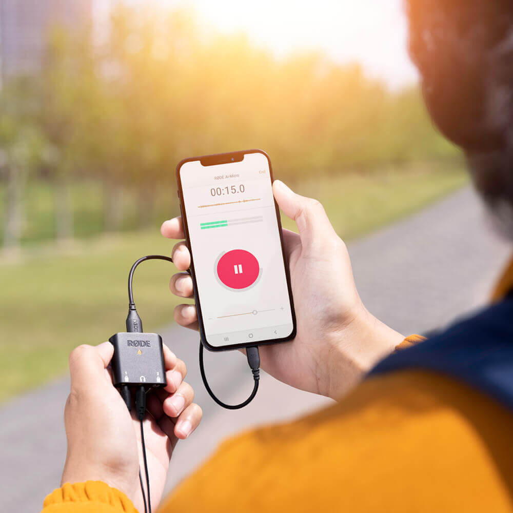 RØDE AI-Micro connected to a smartphone running a recording app outdoors