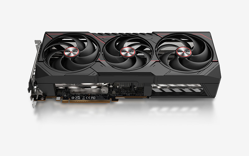 Top-down view of the SAPPHIRE PULSE Radeon RX 9070 XT 16GB GDDR6 graphics card showing full card length and PCIe connector